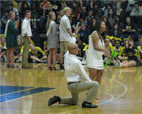 Seniors Eliza Navarro and Michael Puatu are introduced as  Homecoming court candidates for King and Queen at the  Homecoming assembly in Oct.