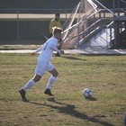 Bryce Riffle kicks soccer ball during game on March 16 at Ocean lakes High School against Northampton. 