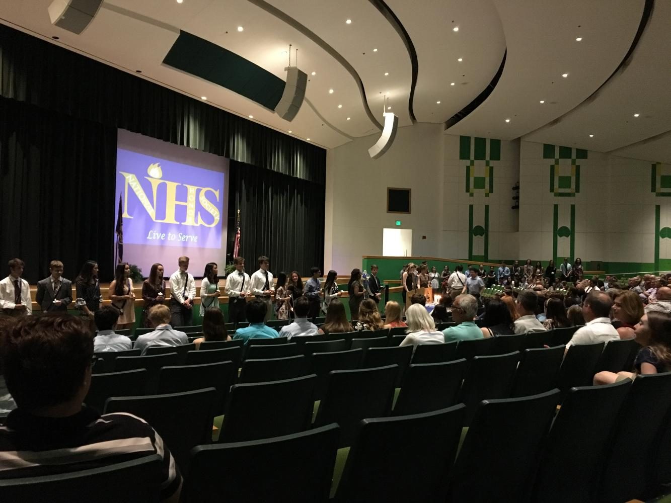 New NHS inductees, parents, and teachers gathered in the auditorium on the night of April 27 for the induction ceremony. 