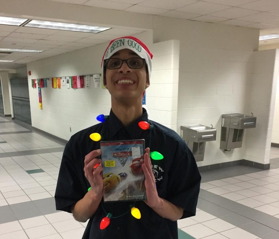 Angelo Shaw poses with his brand new Cars 3 DVD from Schratwieser’s 1B AP Biology class. 