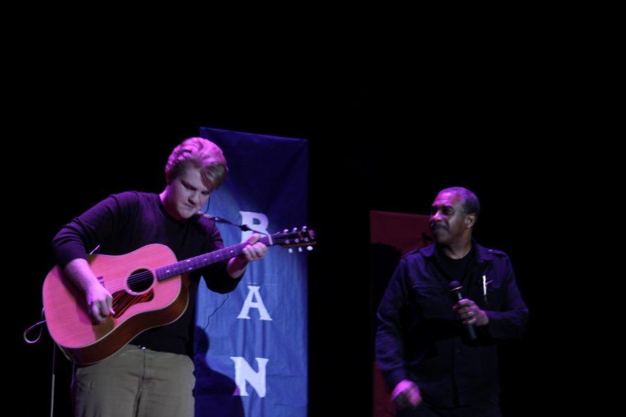 Senior Carson Harrell and Economics teacher Charles Brown perform Free Fallin by Tom Petty.