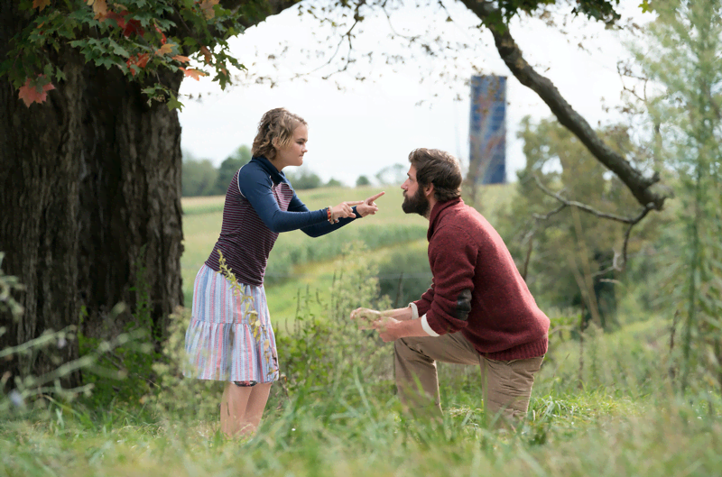 Regan (Millicent Simmonds) argues in sign language with her father Lee (John Krasinski).  