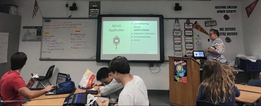 Sponsor Christina Frierman starts the NEHS interest meeting on Nov. 7 in room 134. Sophomores Jason Wieder, David Roulley, and David Lee are also pictured.
Photo by: Ashley Owens