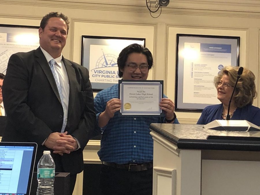 Virginia Beach City Public Schools Superintendent Dr. Aaron Spence and School Board Chairwoman Beverly Johnson award Noah Do for earning a perfect score of 36 on the ACT. Jan. 8, 2019.