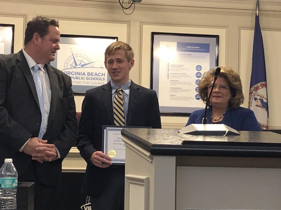 Virginia Beach City Public Schools Superintendent Dr. Aaron Spence and School Board Chairwoman Beverly Johnson award Cole Faggert for a perfect score of 1,600 on the SAT. Jan. 8, 2019.