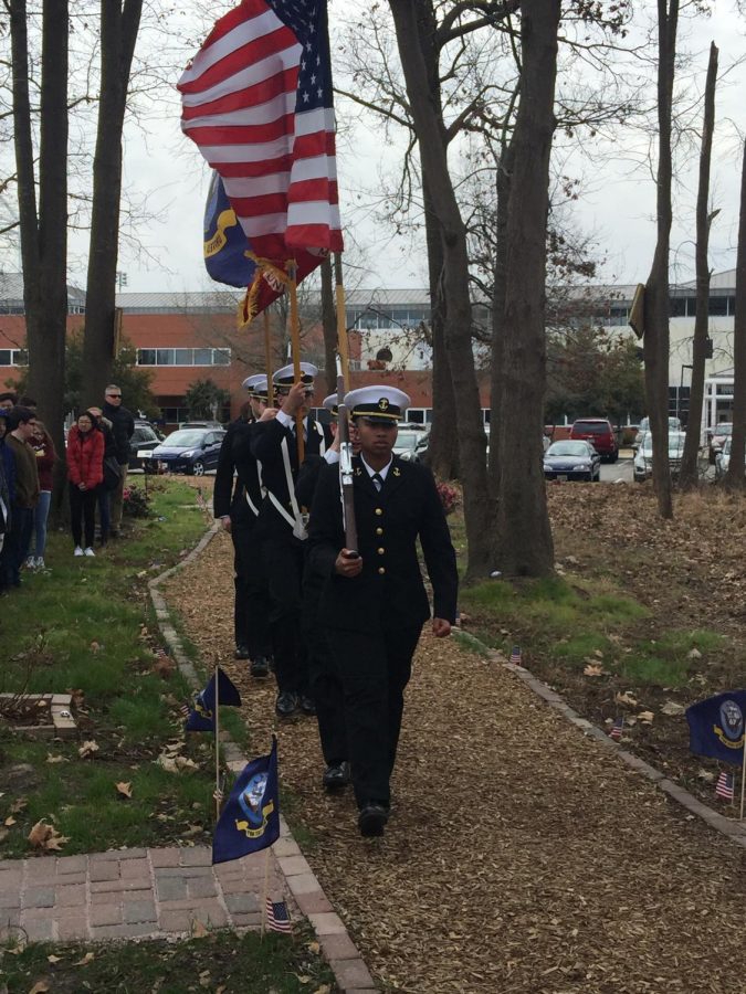 Navy+sailors+present+the+colors+in+honor+of+Mason+on+Feb.+9.