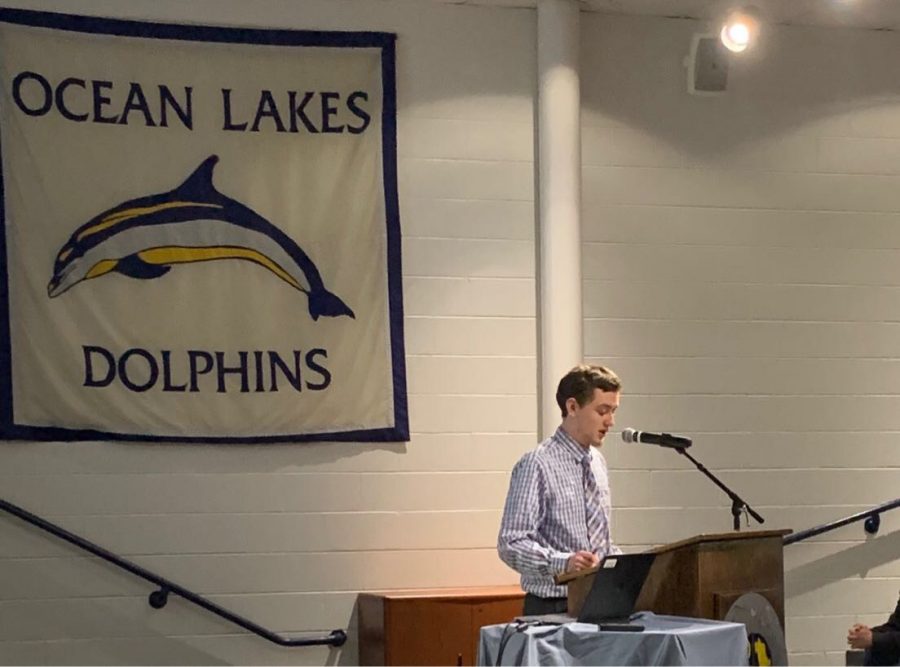 Ethan Boardman giving senior presentation to students in Ocean Lakes Schola. 