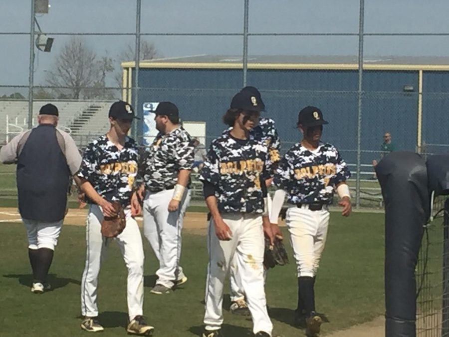 JV baseball walks back to the dugout after an inning on April 25 against Bayside. 