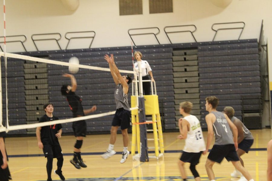 Senior Antonio Velazquez jumps to block a hit in a game against Salem on August 27.