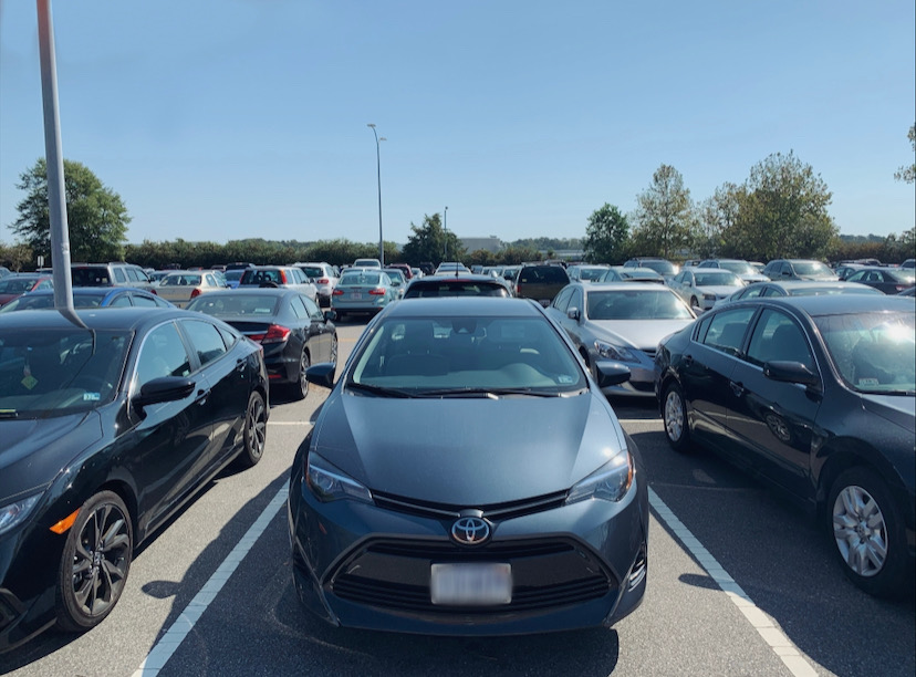 The student parking lot, a perfect example of depreciation. The hundreds of cars parked in the lot lose hundreds of dollars money every day as a result of depreciation. Photo taken on Sept. 26, 2019.