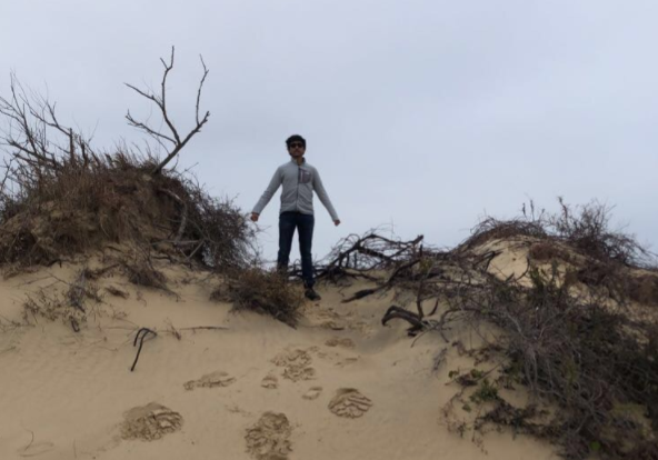 Senior Saighuhan Senthilkumar poses at Jockeys Ridge State Park.