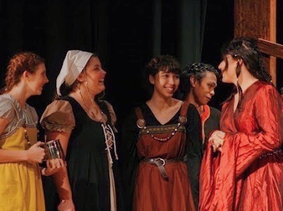 (Left to right) Emilee Darden, Emma Gorman, Grace Hernandez, Julio Bermudez, and Olivia Nery performing in the Ocean Lakes Theatre Company’s adaptation of the Taming of the Shrew in the auditorium on Nov. 24. 