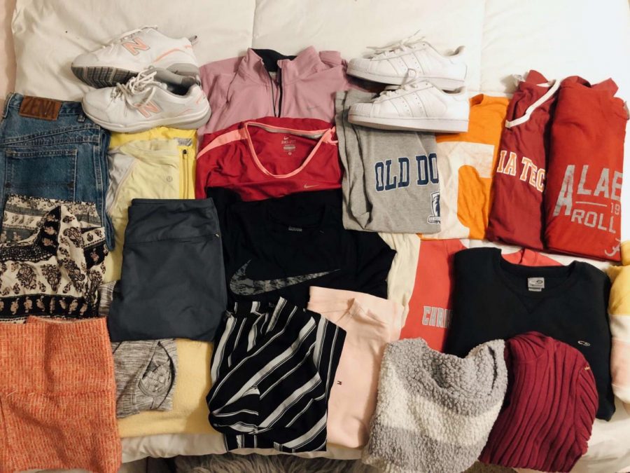 Lindsay prepares to pack up clothing to sell to those who have, through her Instagram, bought them. 