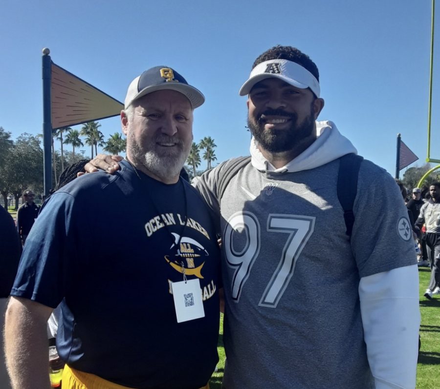 Coach Jones stands alongside Steelers defensive end Cameron Heyward after practice at the Pro Bowl in Orlando, Florida.