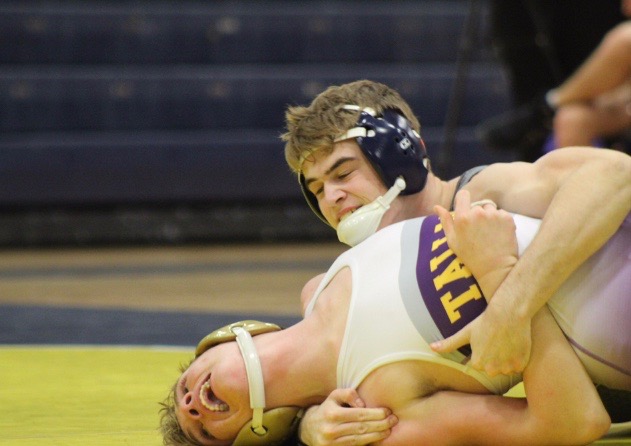 Ethan Crouse wrestles in a match against Tallwood at home on Jan. 16.