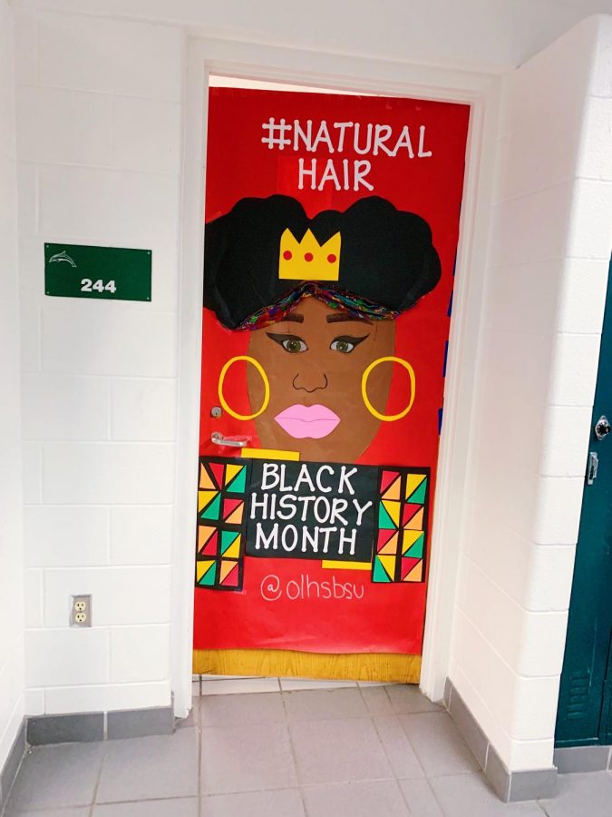 Señora Rosados door, 244, decorated by the Black student union to represent the importance of the natural hair movement in Black culture on Feb. 10.
