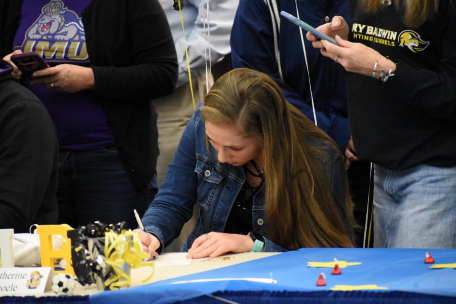 Senior Kate Thoele signs to play soccer for Mary Baldwin University on Feb. 5.