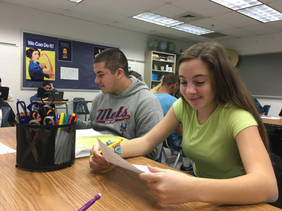 Students Kelly McCarty and Elijah Torres study budgeting vocab terms in economics and personal finance. Taken Jan. 30, 2020.