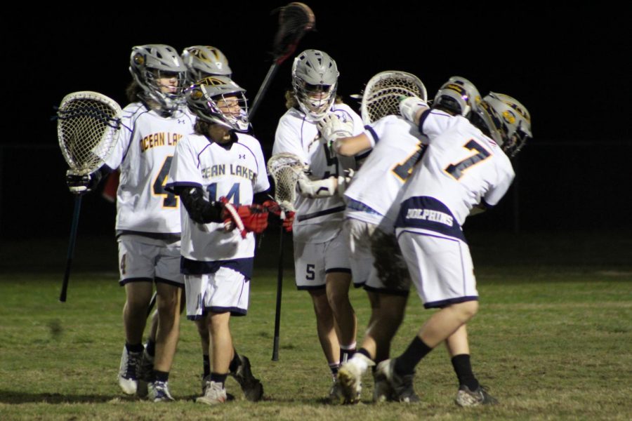 Boys Lacrosse turn to celebrate win against First Colonial on March 10.