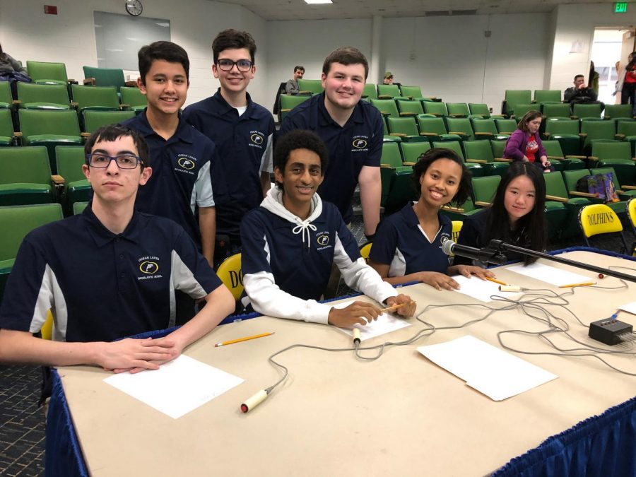 Scholastic Bowl team smiles for picture before final match in regional tournament on Feb. 1. 