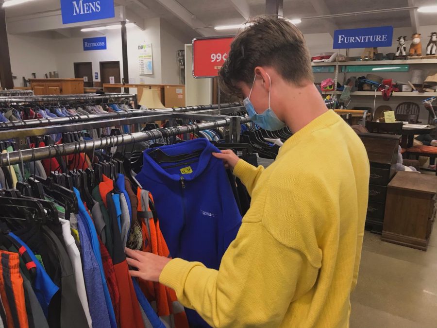 Junior Jacob Ritz browses some of the DAVs clothing racks. 