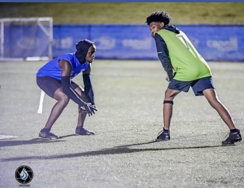 Carlton Winston (Blue) lines up against Jordan Cooper in the VB Hurricanes 7v7 game against the Cox High School Green Machine on Oct. 5 at the Sportsplex.