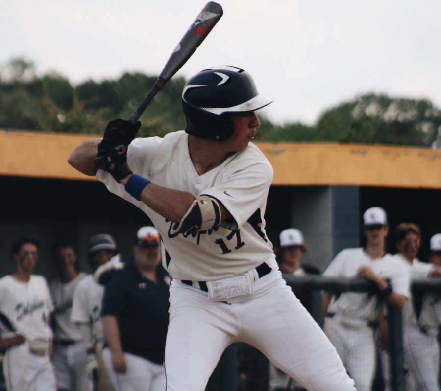 Senior Aidan Pinto lines up to bat in the bottom of the third inning at home on April 29.