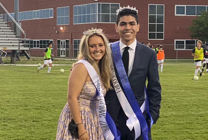 Seniors Reese Thornton and Alan Ledezma were crowned homecoming king and queen and take the field for pictures. 