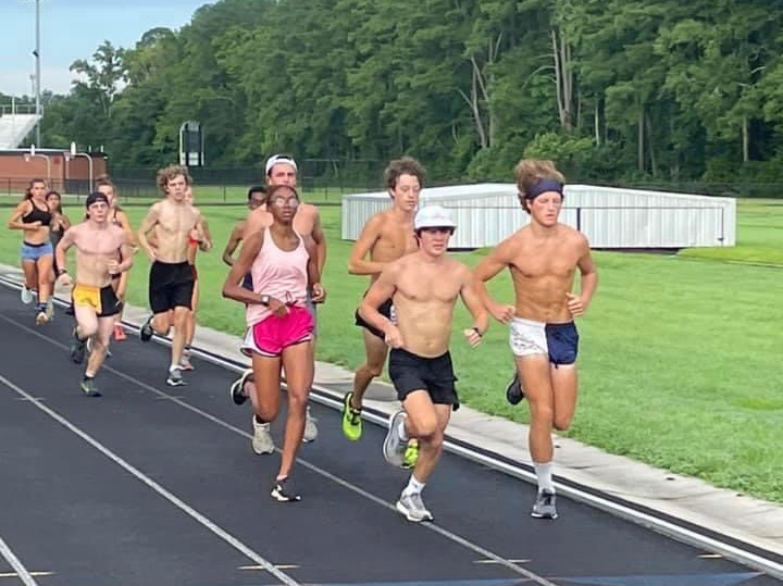 The cross country team meets at Kellam on Aug. 12 to condition for the imminent fall season.
