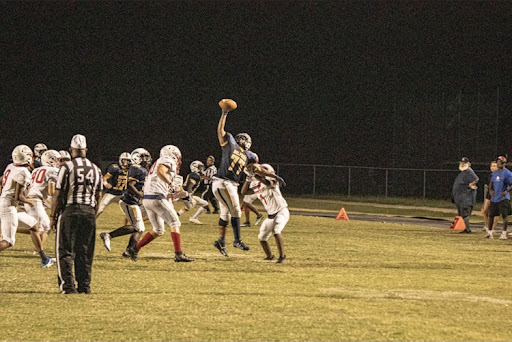 Jaeden Irwin-Harris  No. 77 catches the ball one-handed Fri., Sept. 17 at Ocean Lakes High School.