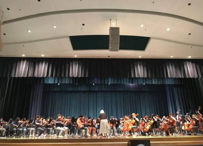 Orchestra performs annual fall concert of the year on Oct. 28 in the auditorium conducted by Karey Sitzler.