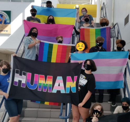 Members of SAGA club showcase pride flags during the second meeting of the year on Oct. 5 in Room 114.