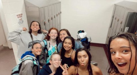 The girls swim team bonds after their tryouts at the Seatack Recreation Center on Nov. 8. 