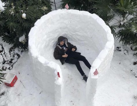 Leondro Cortado and his sister, Kaya, Class of 2017, build a fort every time it snows because the neighborhood has a traditional snowball fight. Although they did not have the annual snowball fight this year, they built a solid igloo. Picture taken on Saturday, Jan. 22, 2022.