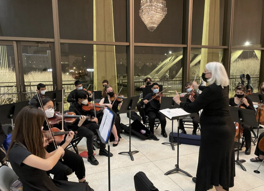 Karey Sitzlers chamber orchestra class performs in the lobby of Chrysler Hall before a performance by the Virginia Symphony on Feb. 11, 2022.