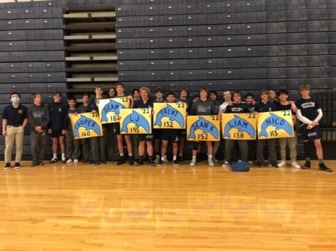 Senior wrestlers gather in the gym to celebrate senior night. Parents and families were invited to attend.