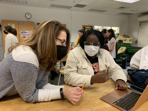 Teacher of the Year Wendy Tate and SCA President Chelsea Agyei work in the SCA workroom on Jan. 27, 2022.