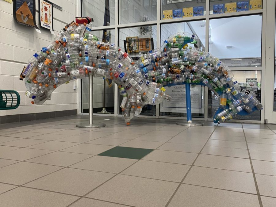 Surfrider and the Art club collaborated to recycle single-use plastic bottles to make a sculpture of the OL mascot, a dolphin. The sculpture was completed and put on display outside the library on May 6, 2022. (Taken by Halle Packard) 
