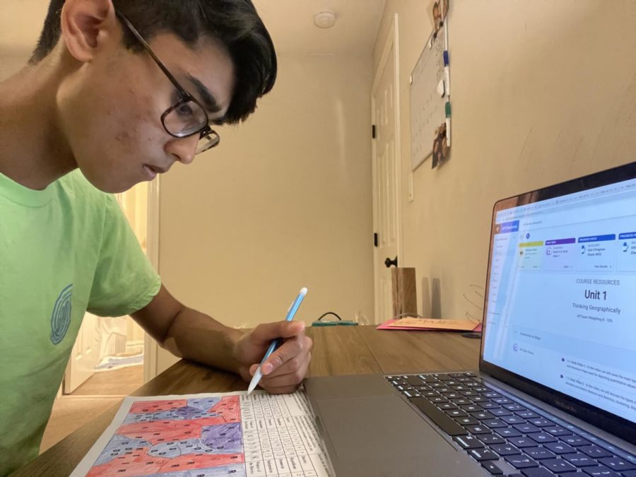 Freshman Malav Shah utilizes resources to prepare for an upcoming AP Human Geography Exam on May 3, 2022.