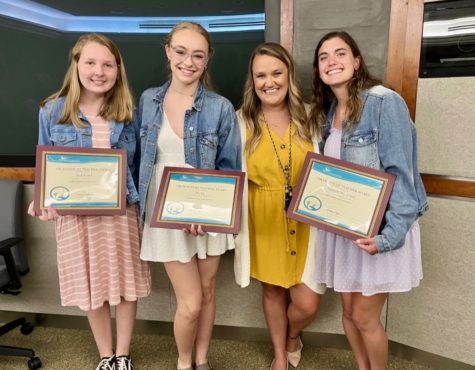 Kayla Rockhill, Ava Estes, Jordan Turner, and Maggie Reed accept their certificates on May 24, 2022 at the School Board Meeting.
