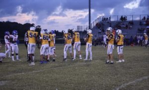 The Dolphins line up against the Chiefs to start a play at Ocean Lakes Stadium on Sept. 9. 