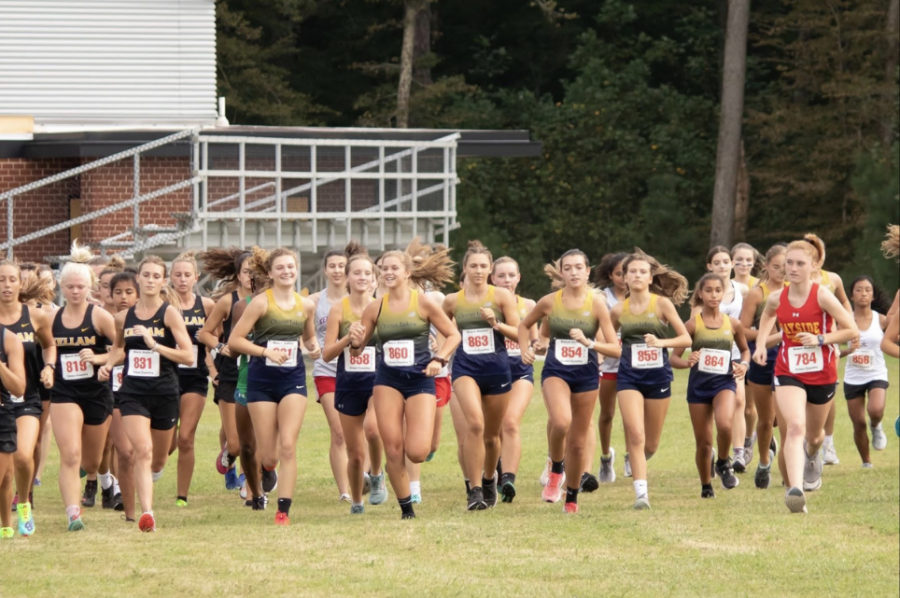 Girls Cross Country races in the first Beach District meet on Sept. 14, 2022 at Kellam High School. 