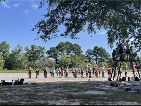 Marching band rehearses drill at Ocean Lakes High School on Aug. 17, 2022. 