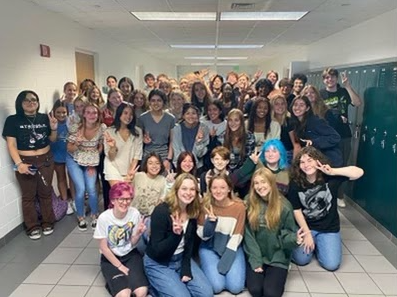 The Surfrider Club poses for a picture after the first club meeting of the school year at Ocean Lakes on Monday, Sept. 26, 2022.