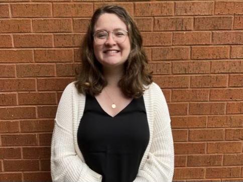 Ocean Lakes’ newest band director, Katelyn Proffitt, stands in front of the music department building on Tuesday, Oct. 4, 2022. 