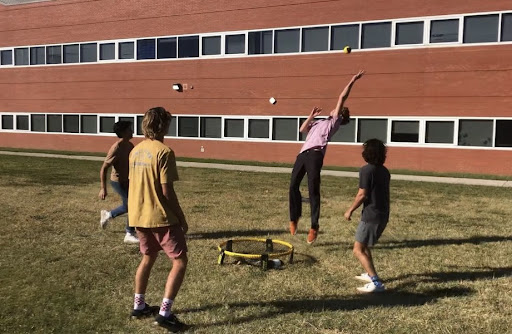 Spikeball club members, JP Estrada, Jack Hancock, Andrew Luksik, and Landon Luzak compete in the club tournament on Oct. 19, 2022, at Ocean Lakes High School.