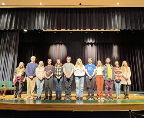 Cast of The Hearing gathers together for a picture in the auditorium on Jan. 23, 2023. 