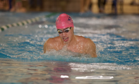 Colin Mamaril helped place first in the boys 200m medley relay against Cox High School at Great Neck Rec Center with an overall time of 1:55.02 on Jan. 13, 2023.
