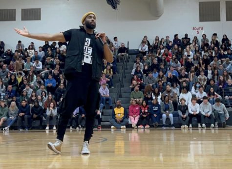 Monti Washington speaks out to staff and students at Ocean Lakes High School, on March 10, 2023, during Founders Week closing all-school assembly.