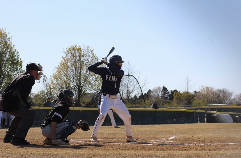 Colin+Benson+bats+against+Landstown+in+the+second+inning+on+March+15%2C+2023.+